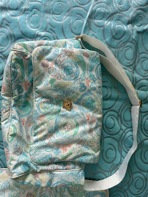 versace diaper bag blue|Versace baby onesie.